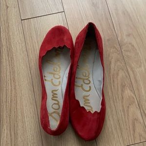 Red microsuede ballet flat with scallop detail